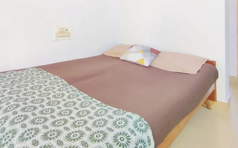 Feature Image of Srinivar Apartment right room