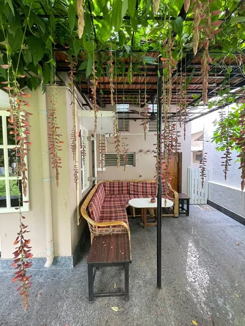 Open sitting veranda with greenery